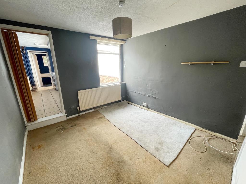 Lot: 144 - TERRACE HOUSE FOR IMPROVEMENT - Dining Room with stairs to first floor and access to kitchen
